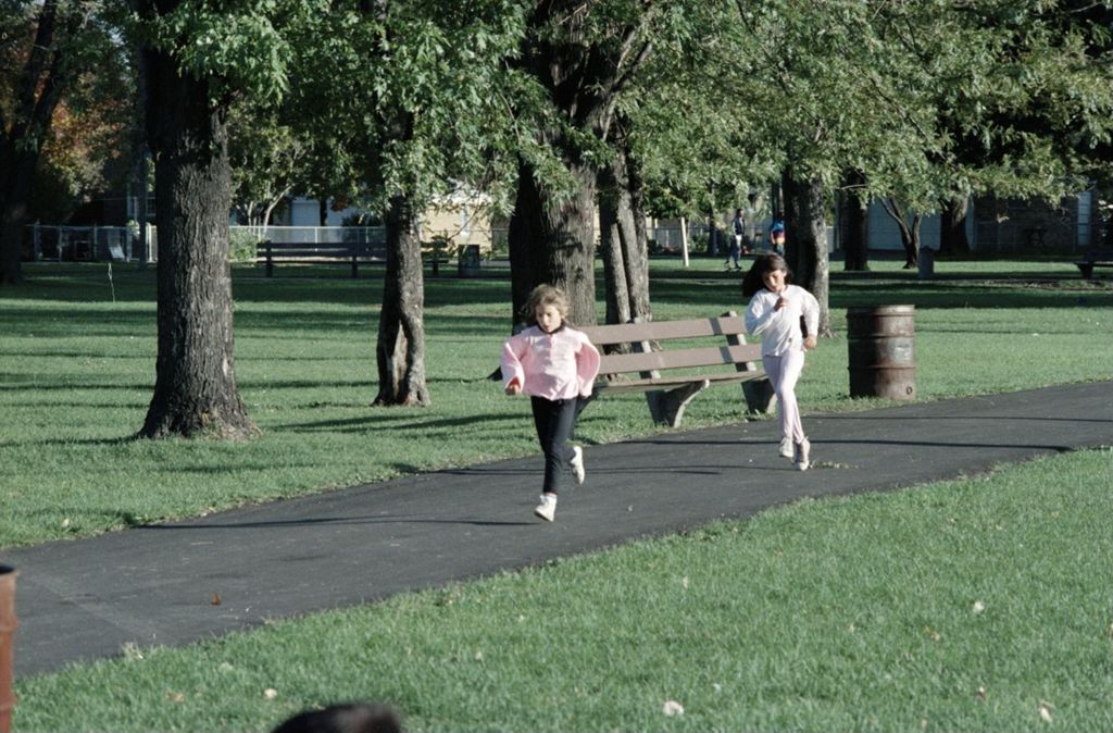 Miniature of Two girls running in the park