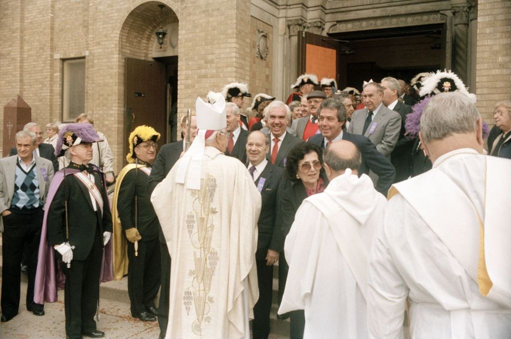 Congressman Frank Annunzio leaving the Shrine of our Lady of Pompeii after a service
