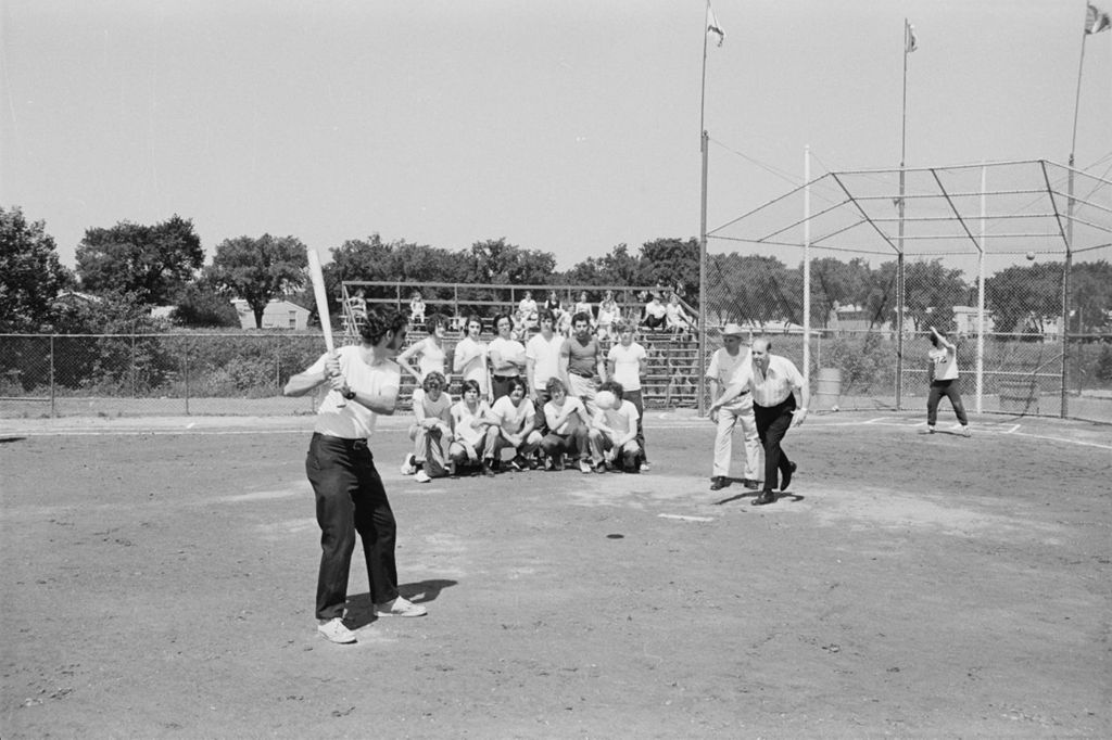 Miniature of Congressman Frank Annunzio pitches a ball to open tournament