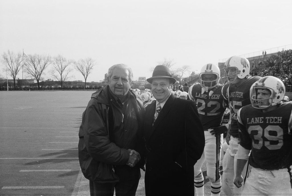 Congressman Frank Annunzio meets the Lane Tech football coach