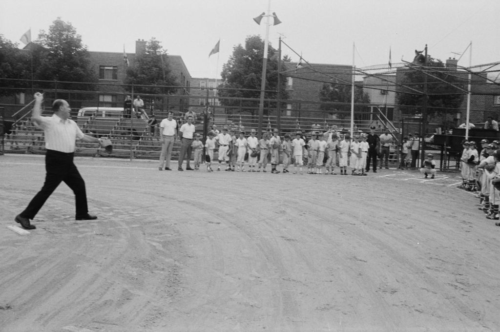 Miniature of Congressman Frank Annunzio throws out league ball at Thillens Stadium