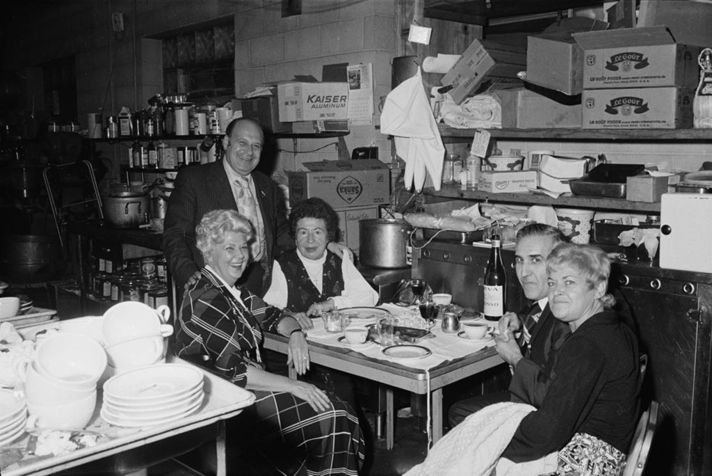 Miniature of Congressman Frank Annunzio has fun at a Laurino party in the kitchen