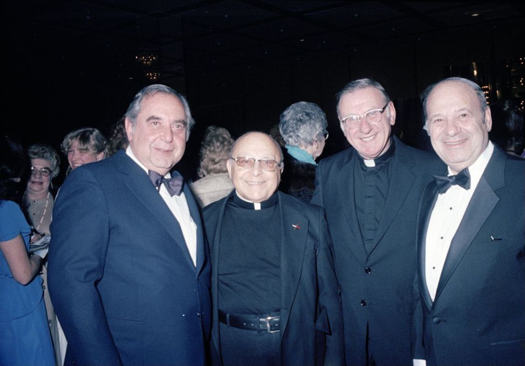 Miniature of Congressman Frank Annunzio with priests and Frank Sinatra's agent