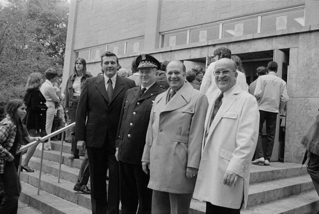 Congressman Frank Annunzio with Police Officers and officials