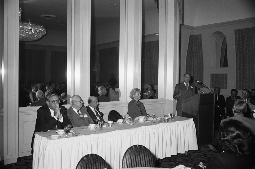 Congressman Frank Annunzio speaking at a podium