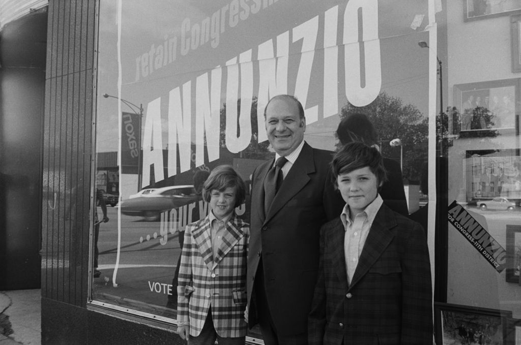 Miniature of Congressman Frank Annunzio in front of his campaign office with his grandsons