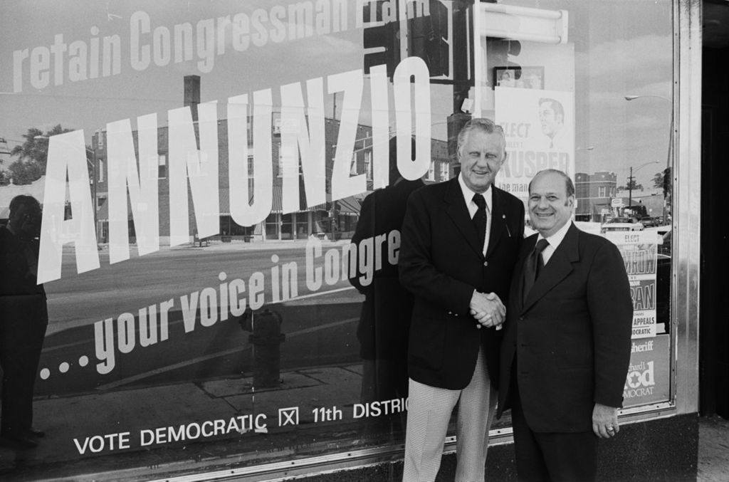 Congressman Frank Annunzio with Harry Semrow in front of campaign office