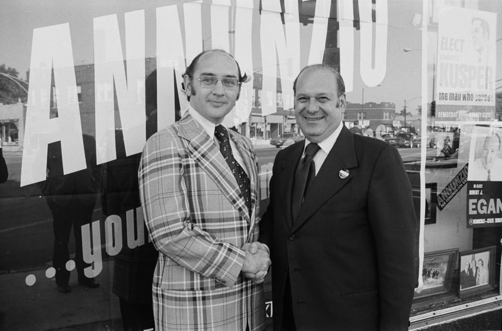 Congressman Frank Annunzio with Alderman Sol Gutstein in front of Annunzio's campaign office