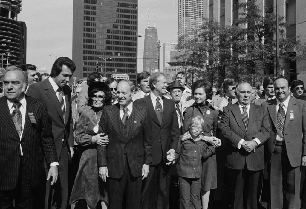 Jimmy Carter and family in a downtown parade