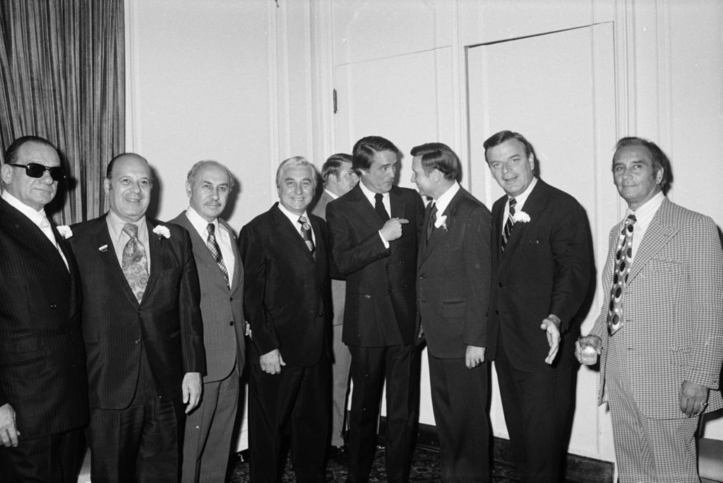 Miniature of Congressman Frank Annunzio posing with a group of men