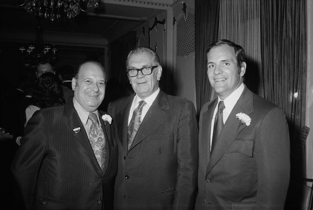 Miniature of Congressman Frank Annunzio with two men