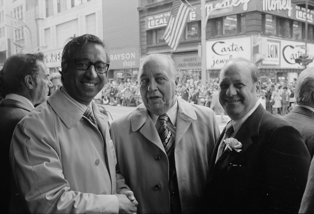 Miniature of Congressman Frank Annunzio with two men at the Columbus Day Parade