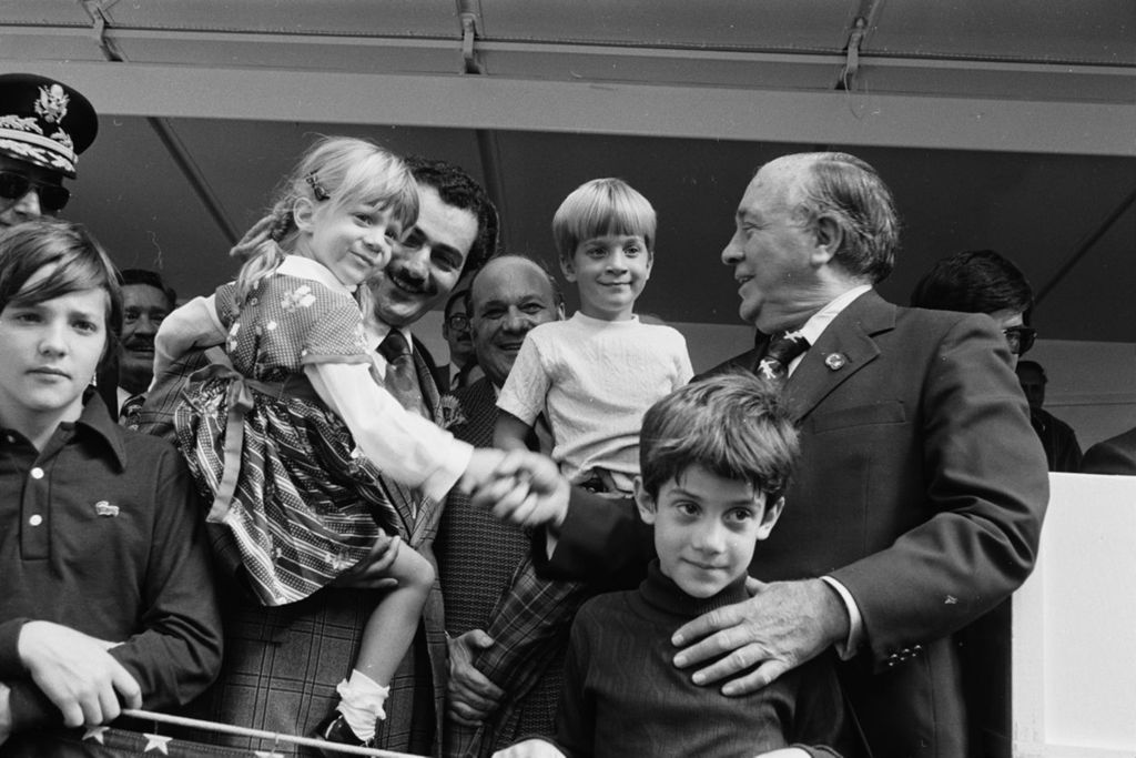 Miniature of Congressman Frank Annunzio and Mayor Daley with children at the Columbus Day Parade