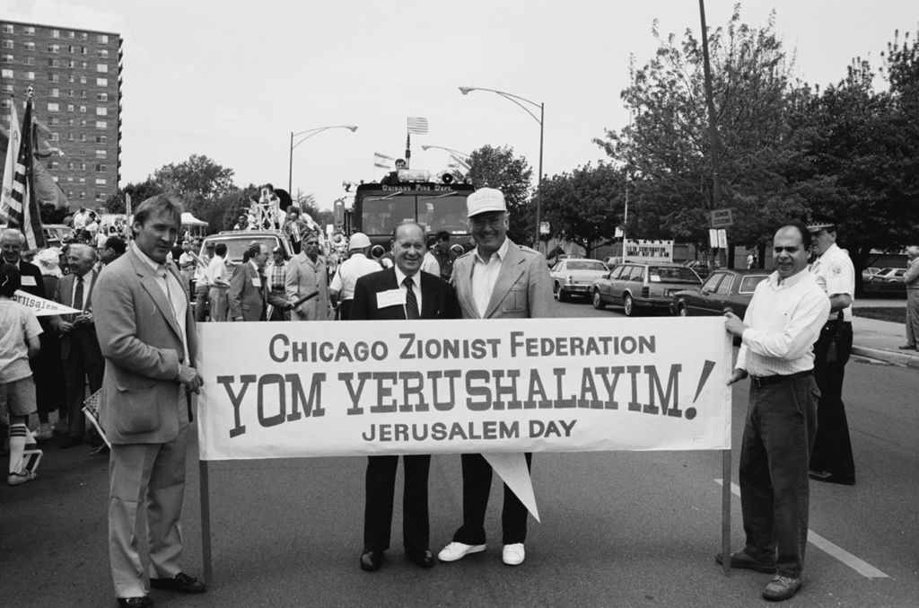 Congressman Frank Annunzio posing with the Chicago Zionist Federation at the Jerusalem Day Parade