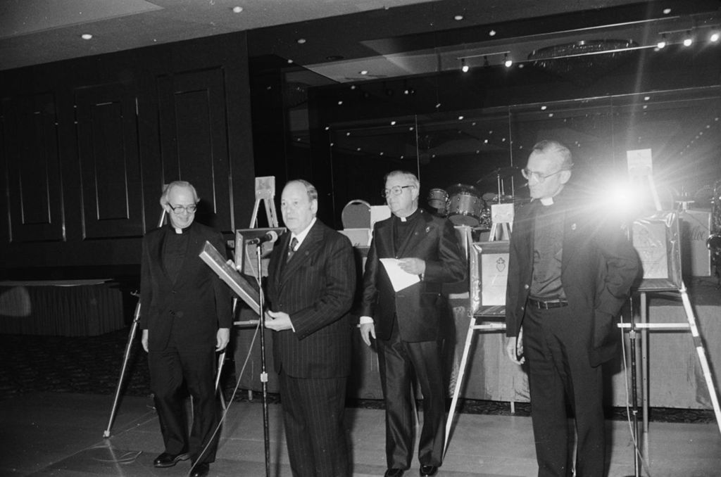 Congressman Frank Annunzio with three clergymen