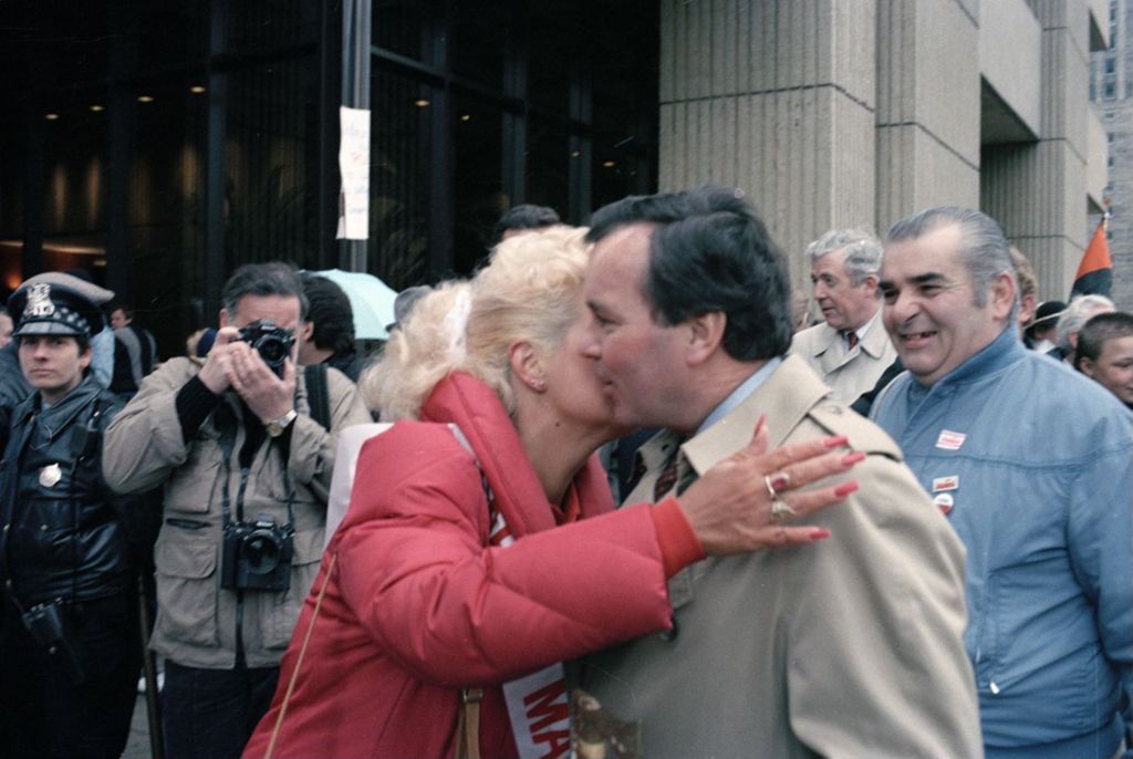Richard M. Daley recieves a kiss