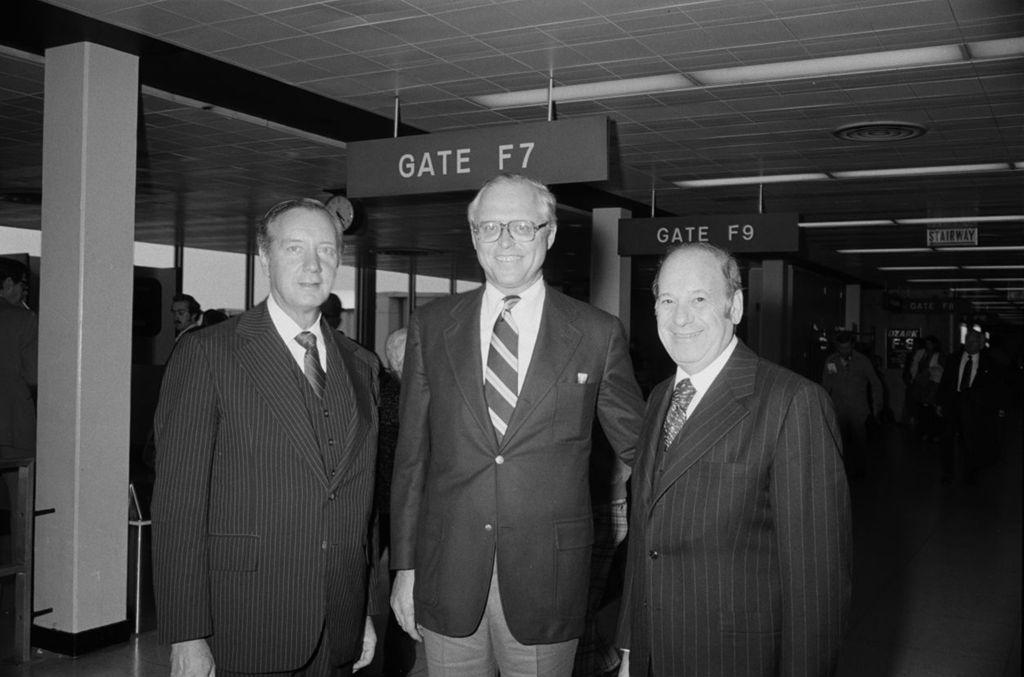 Miniature of Congressman Frank Annunzio and Mayor Bilandic meet Columbus Day Parade Chairman at airport