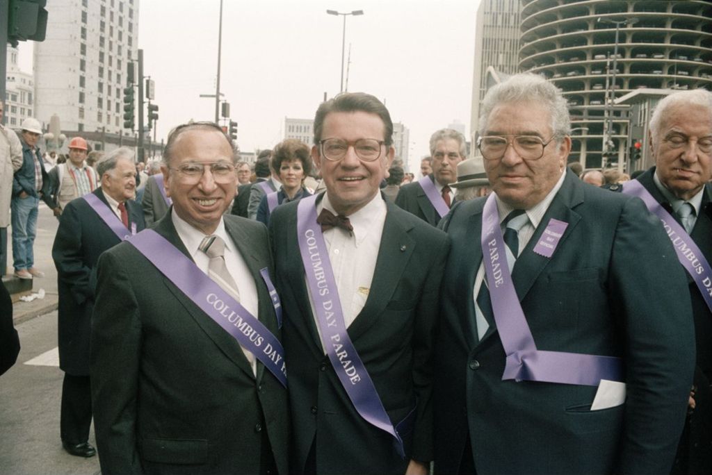 Mario Rubinelli, Paul Simon, and George Hagopian at Columbus Day Parade