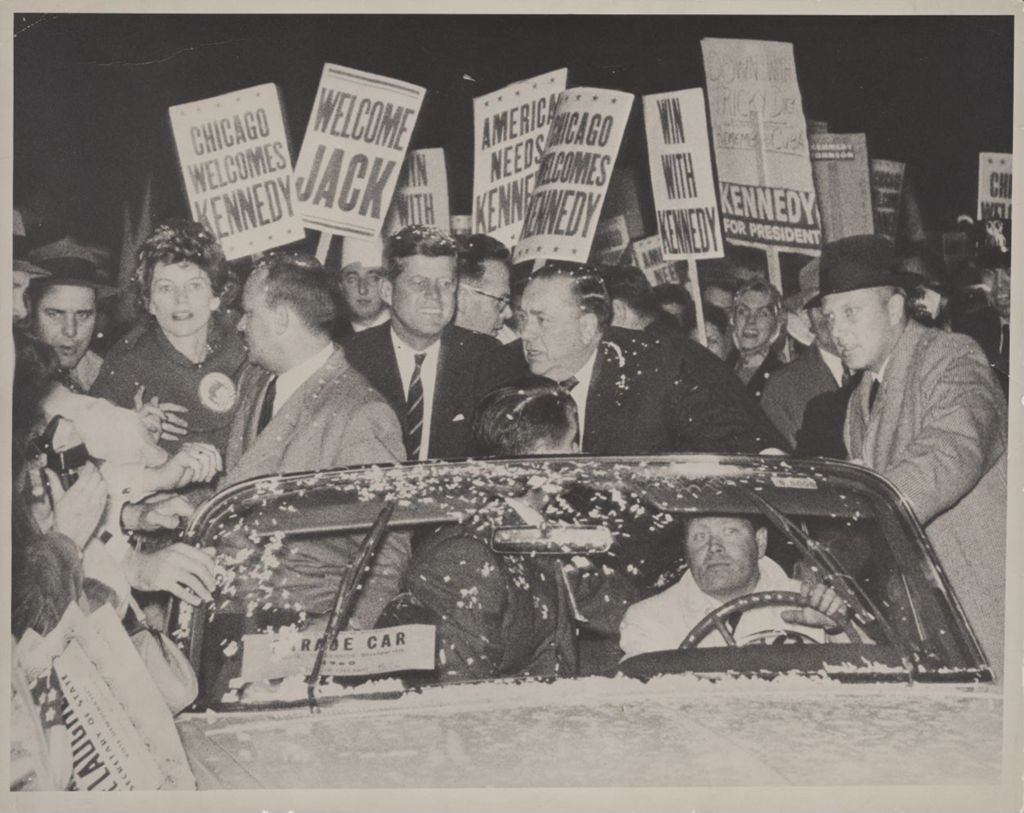 John F. Kennedy and Richard J. Daley in a torchlight parade