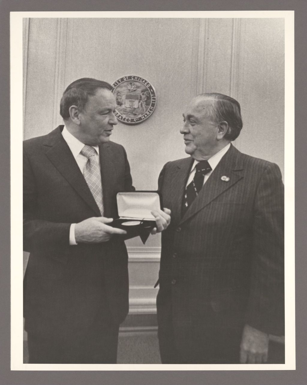 Miniature of Frank Sinatra accepts medal from RIchard J. Daley