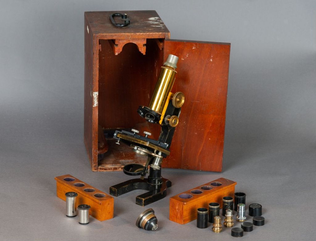 Miniature of Spencer Lens Co. Monocular Microscope, wooden case, and lenses