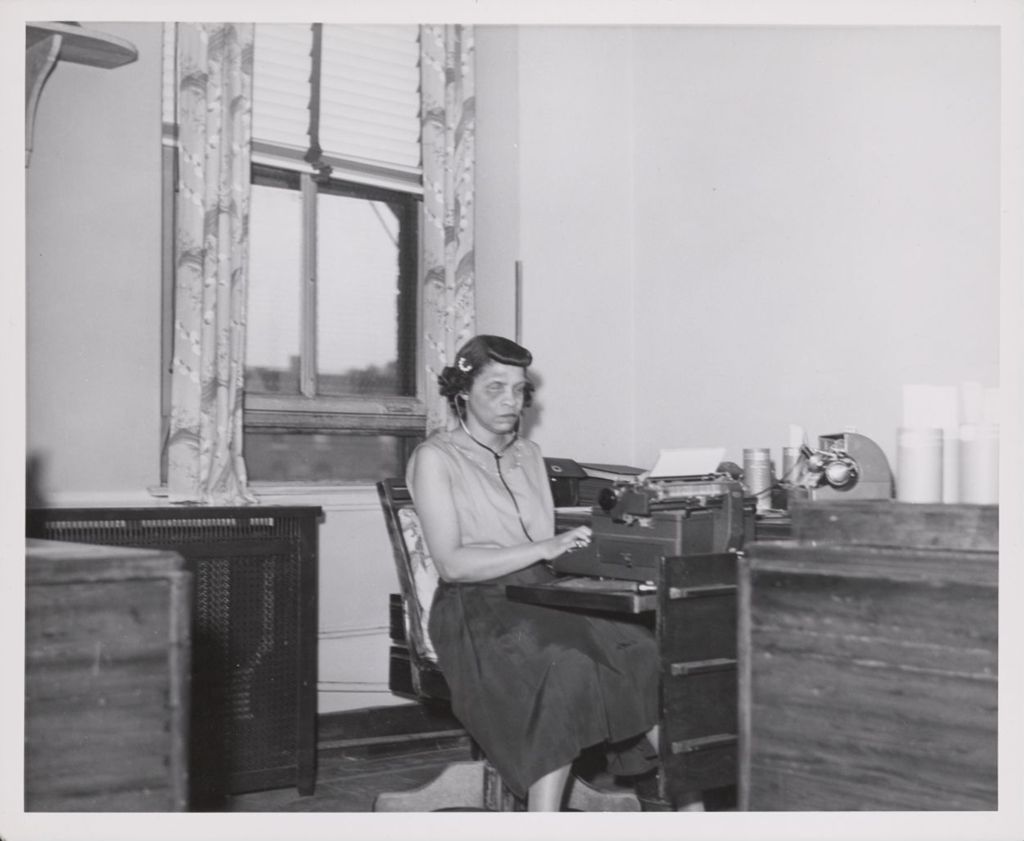 Miniature of Virginia Rice typing while using a dictaphone