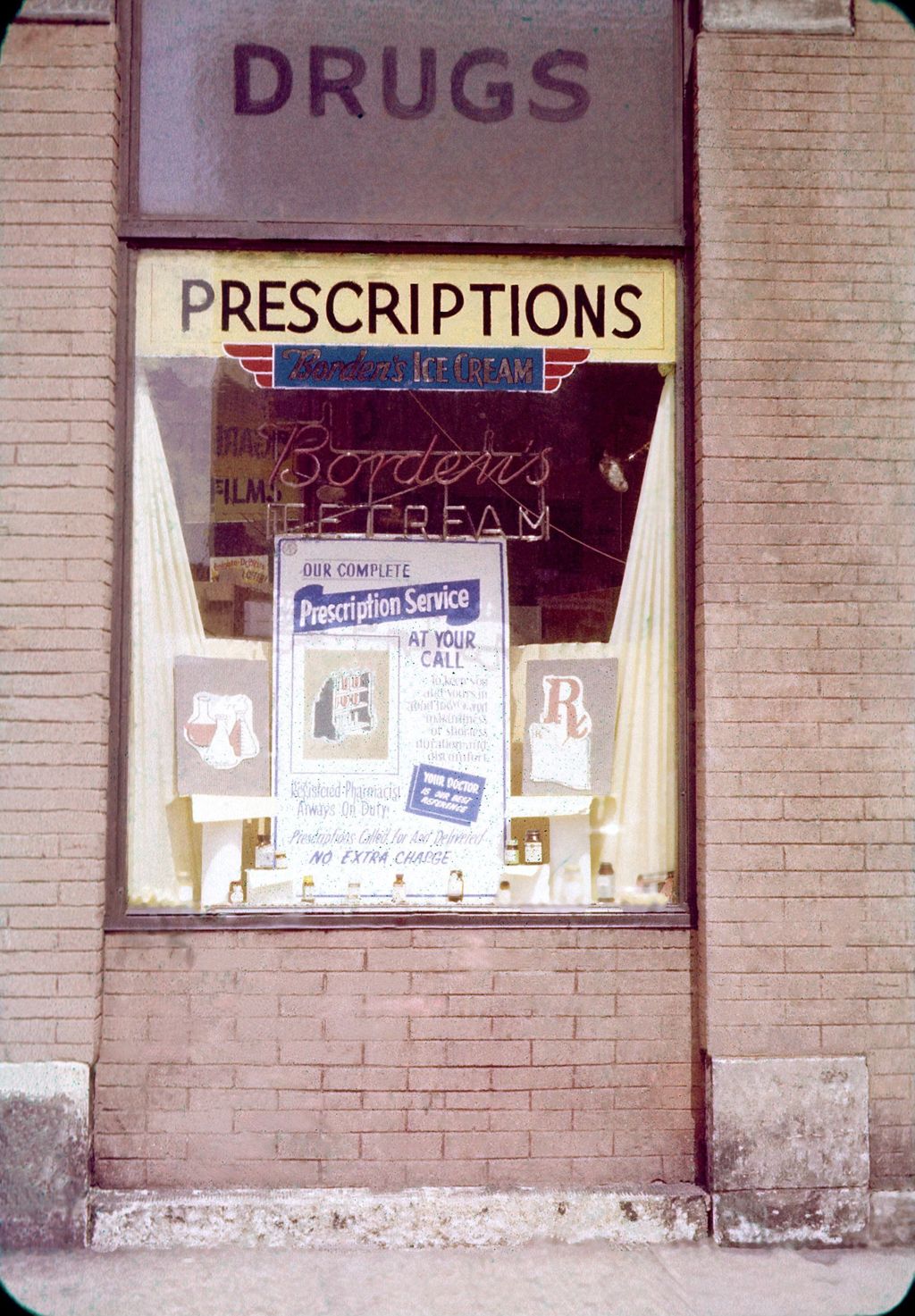 Window at Harry's Drugs, S. Leavitt Street and 23rd Place