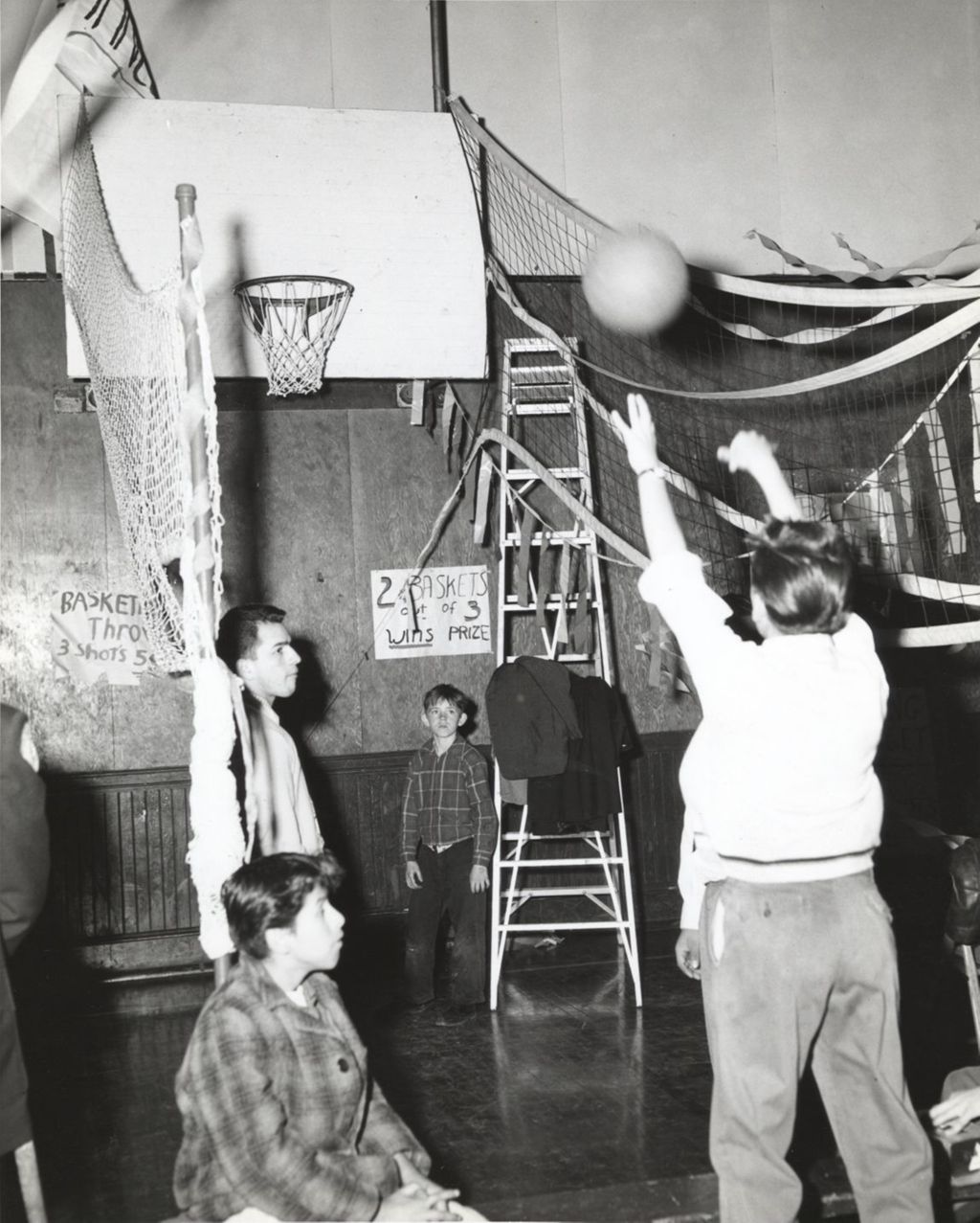 Shooting basketballs at an event