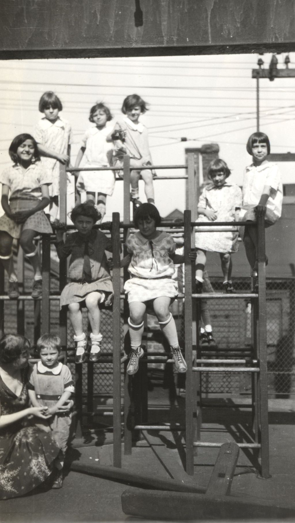 Children on playground climbing structure