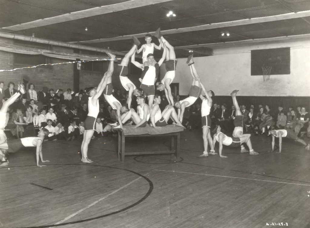 Teenage boys performing acrobatic routine