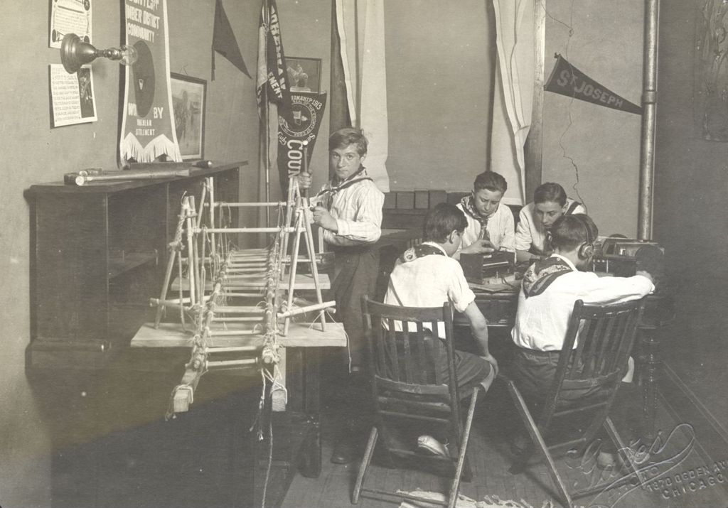 Miniature of Boys in scouting uniforms working on various projects