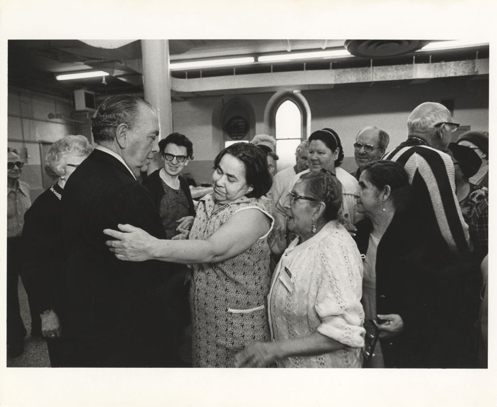 Miniature of Richard J. Daley with a group at a St. Pius V Church event