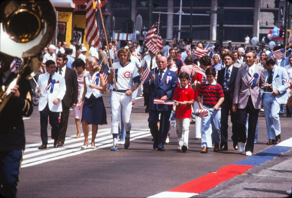 Miniature of Richard J. Daley marching in "Salute To American Flag" parade