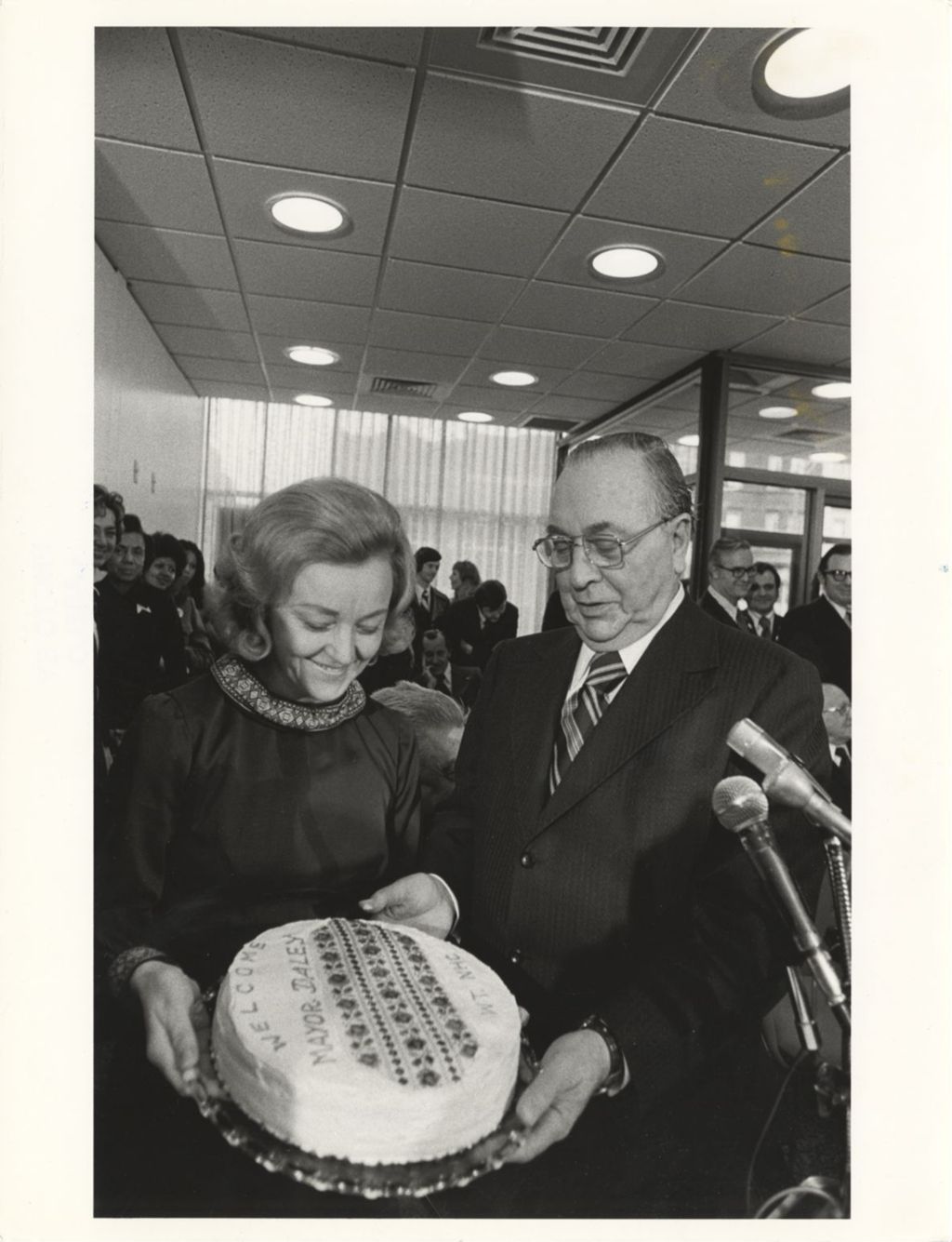 Miniature of Richard J. Daley accepts a decorated cake