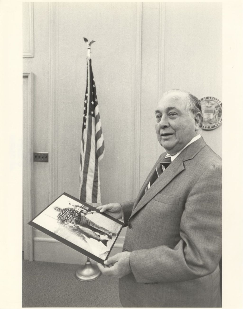 Miniature of Richard J. Daley with a gift photograph