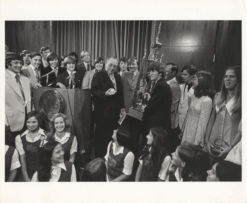 Miniature of Richard J. Daley with students and baseball trophy