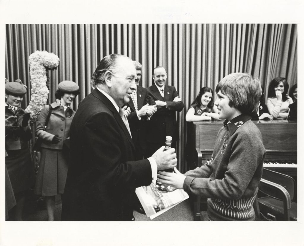 Richard J. Daley accepts gift from a young performer