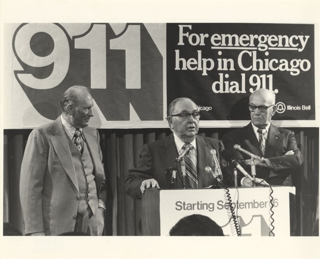Miniature of Richard J. Daley at press conference for new 911 system