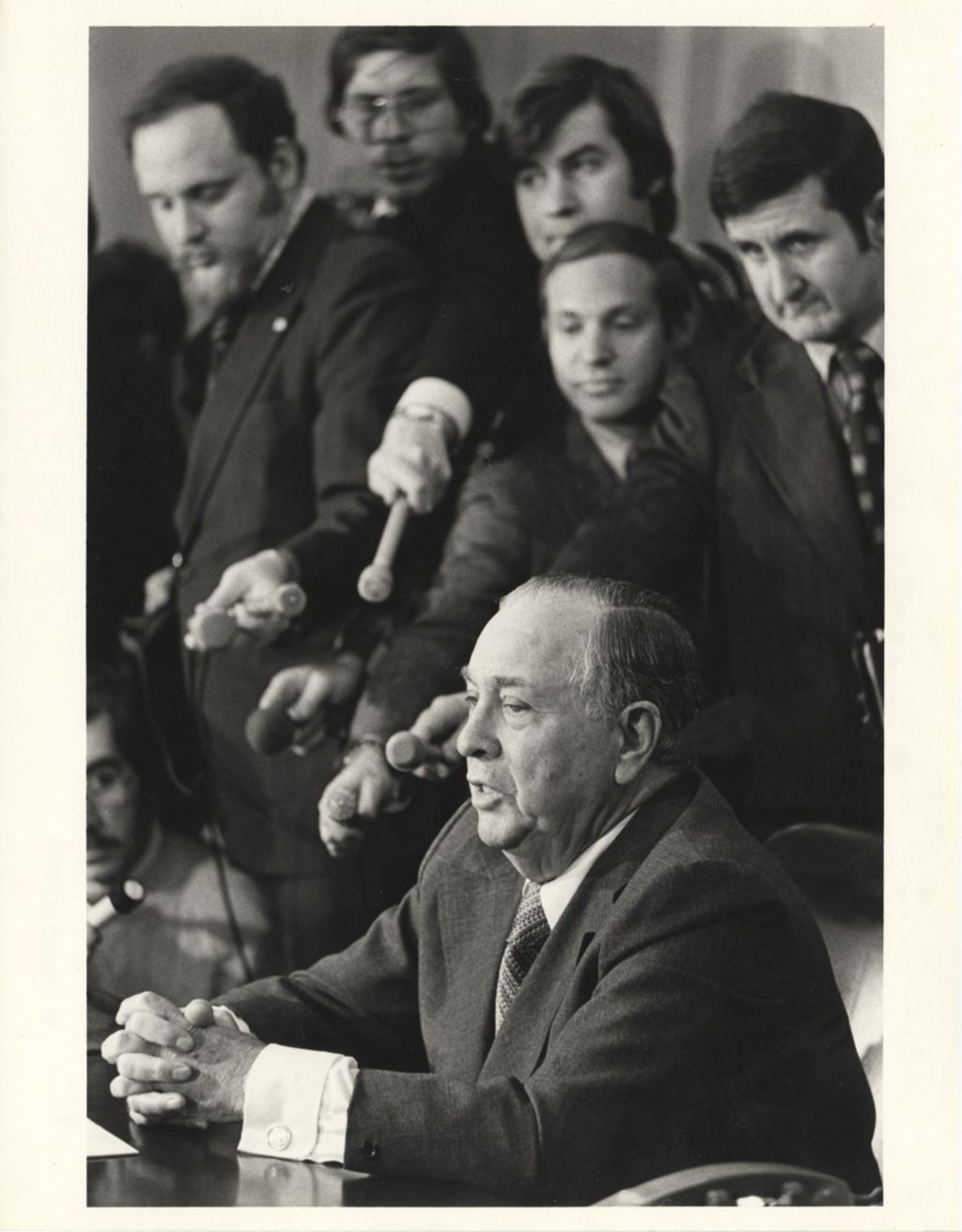 Miniature of Richard J. Daley and reporters at a meeting