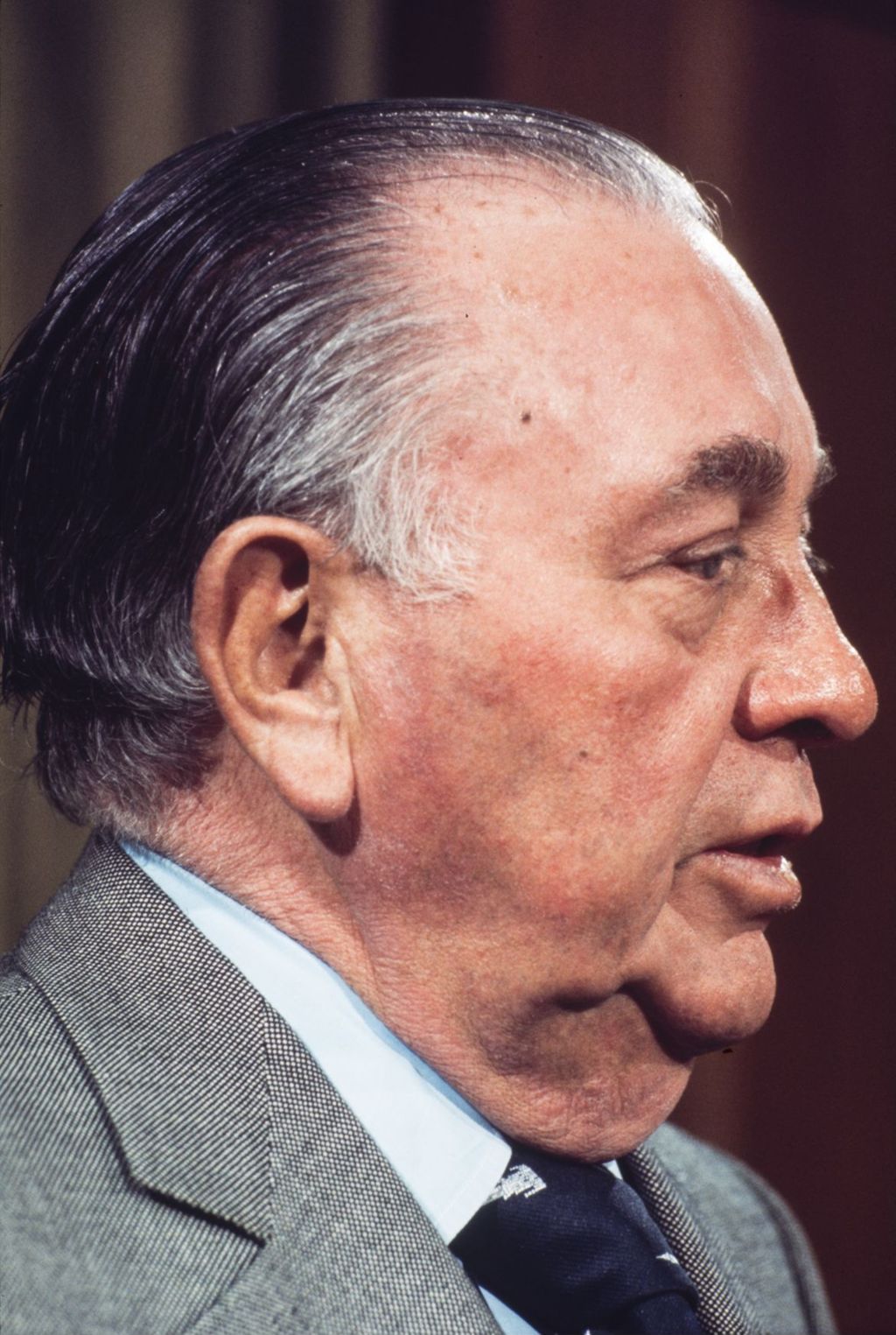 Portraits of Richard J. Daley at a press conference in City Hall