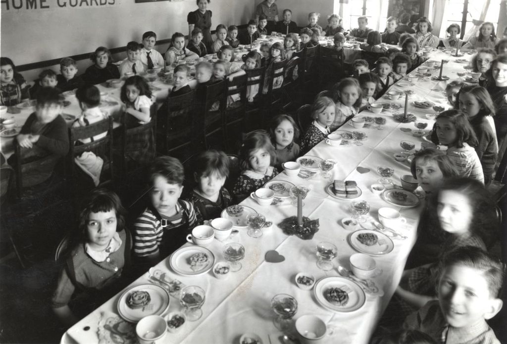 Children eating desserts at Home Guards and Mother Jewels Anniversary party
