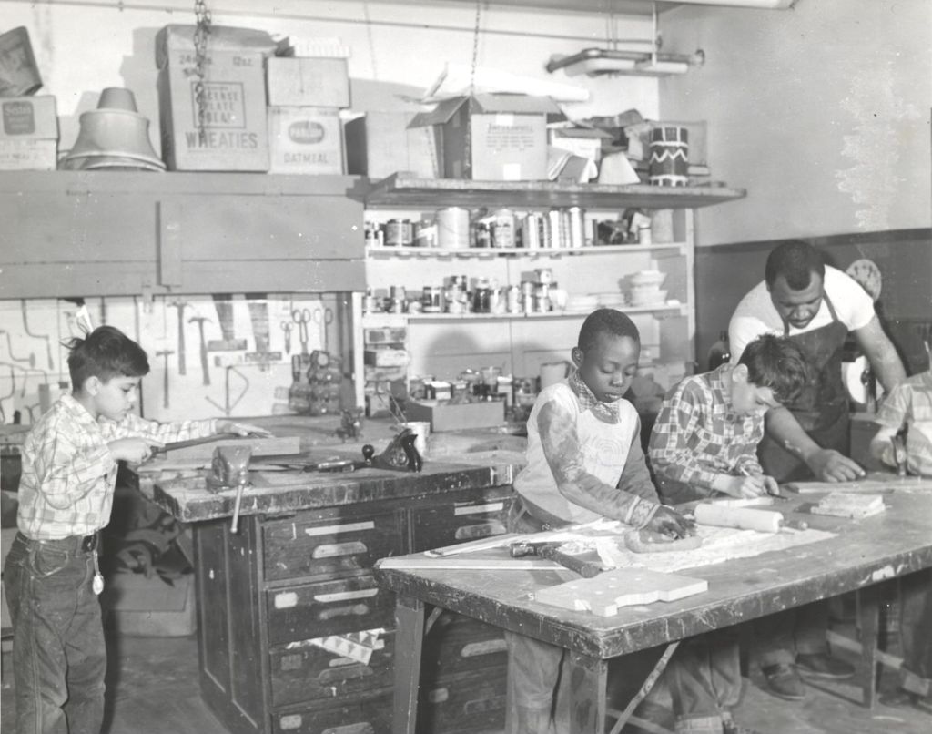 Boys working in craft shop