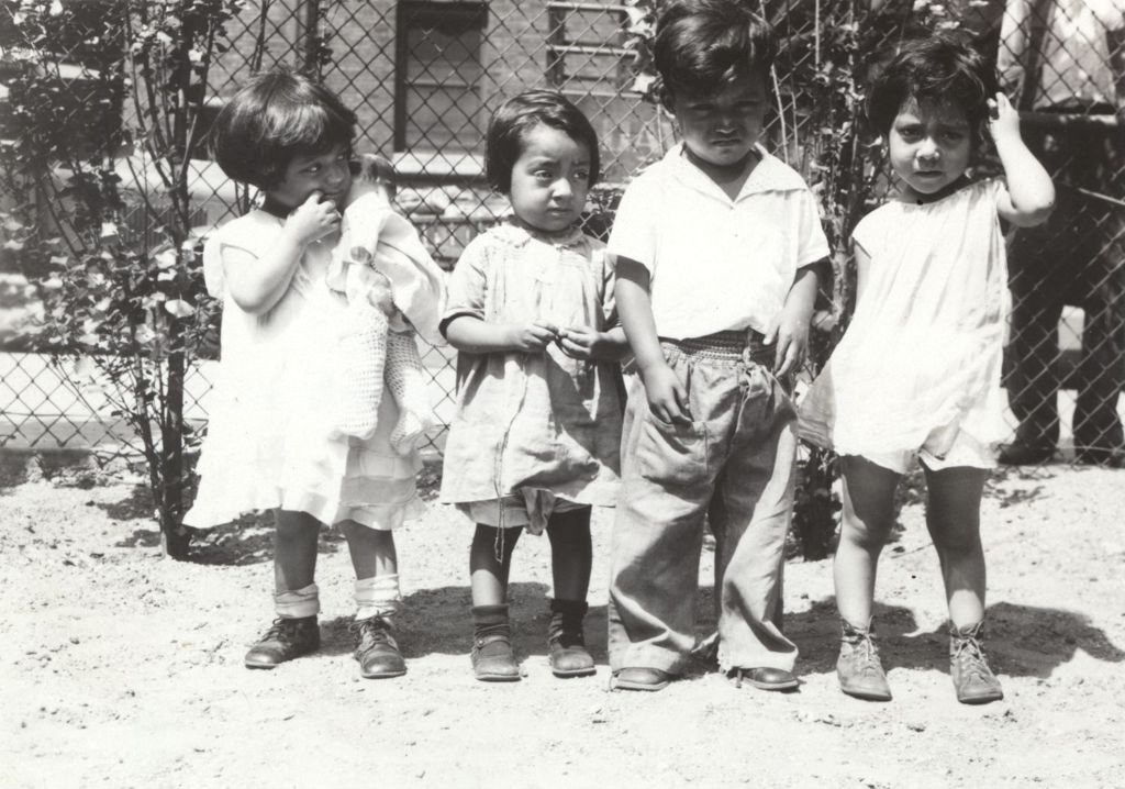 Miniature of Young Latino children at the Marcy Center playground