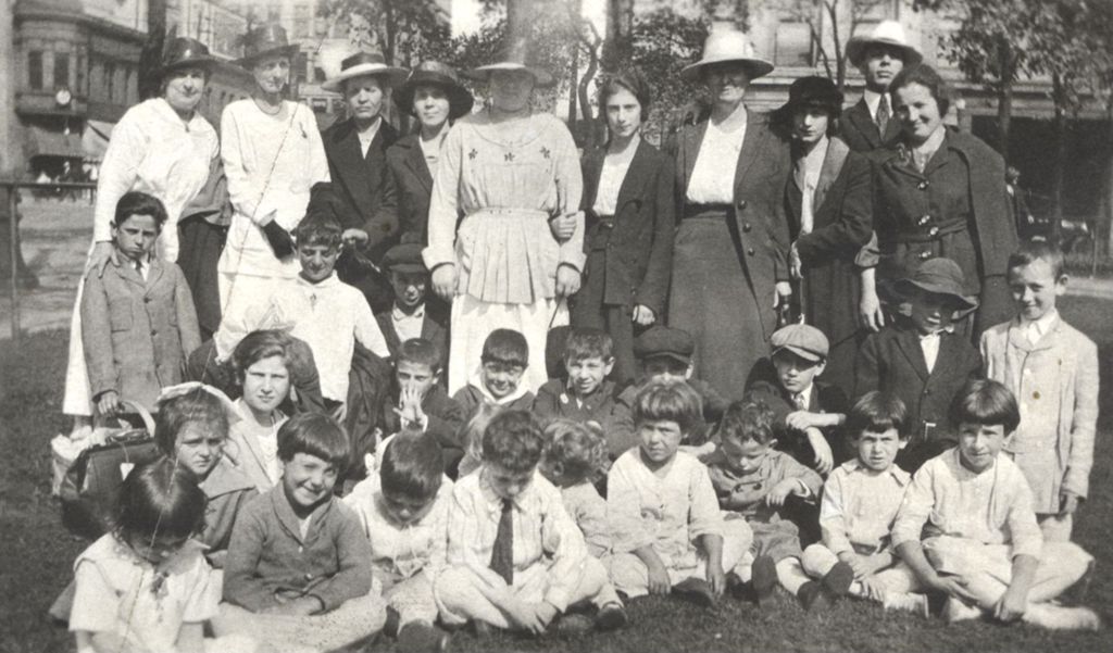 Group of women and children in a city park