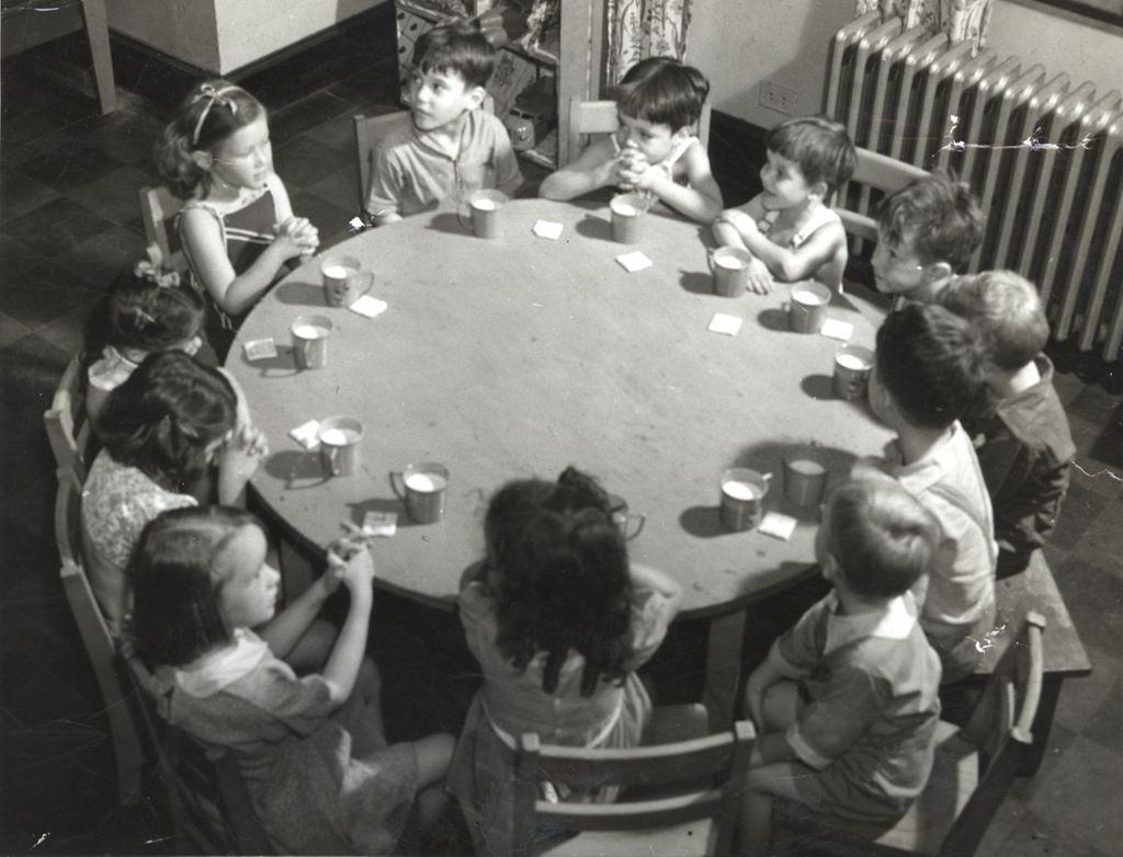 Miniature of Children at table for snack time
