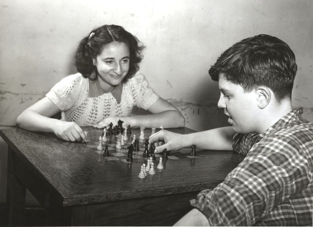Miniature of Boy and girl playing chess