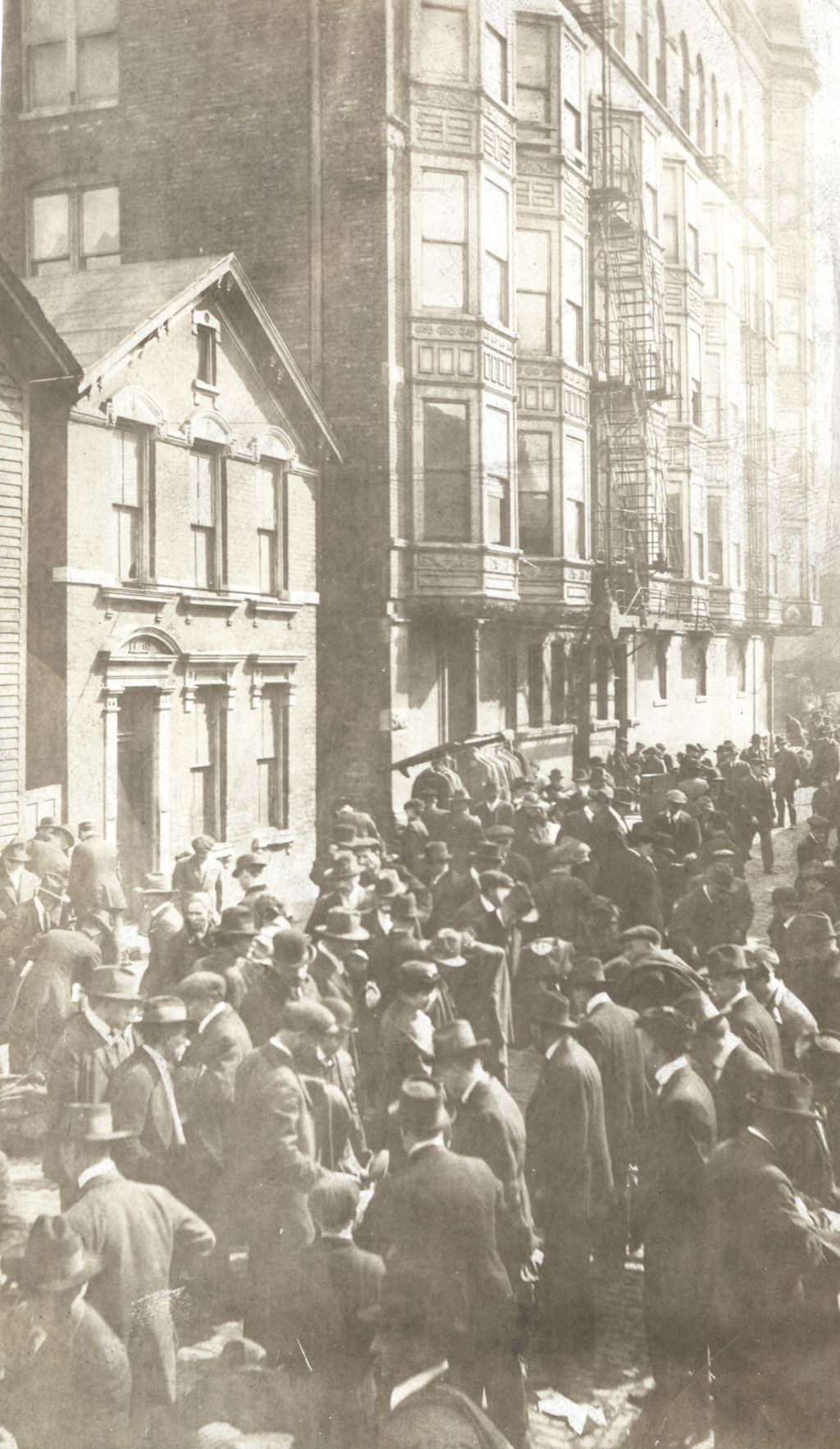 Crowd of men on Maxwell Street