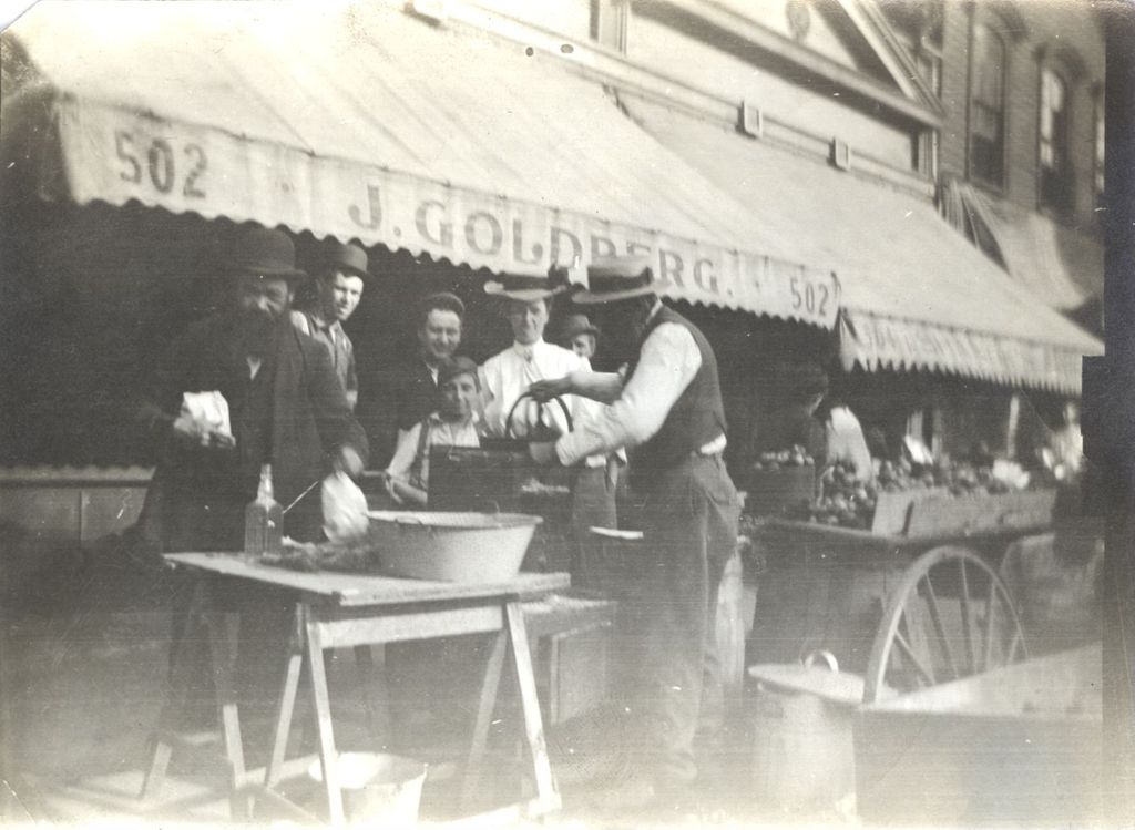 Miniature of Man grinding horseradish, Maxwell Street