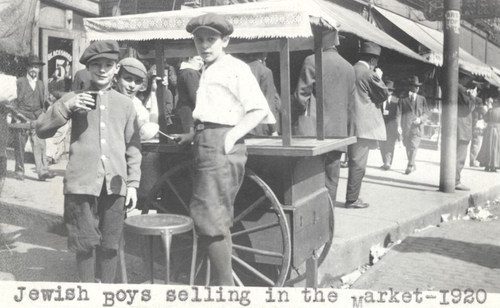 Jewish boys with push cart in the Maxwell Street market