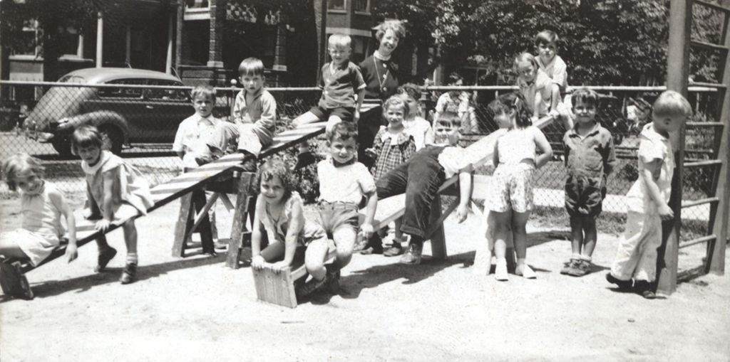 Children on teeter-totters in Marcy Center playground